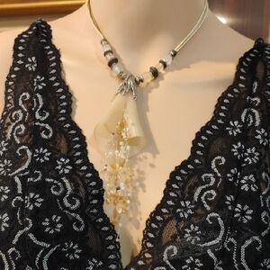 Elegant Gold and Silver Pendant Necklace